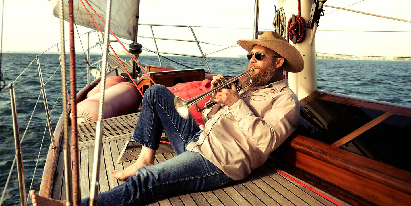 gentleman relaxing on boat